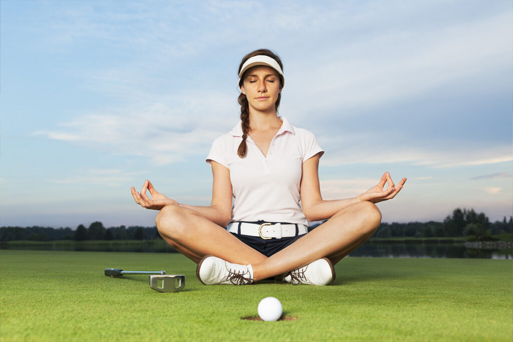 Millennial women practicing golf-focused meditation at Quixotic Golf